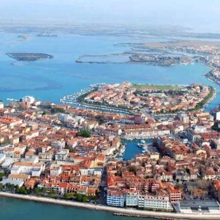 Апартаменты Charming Four Guests With Lagoon View Градо